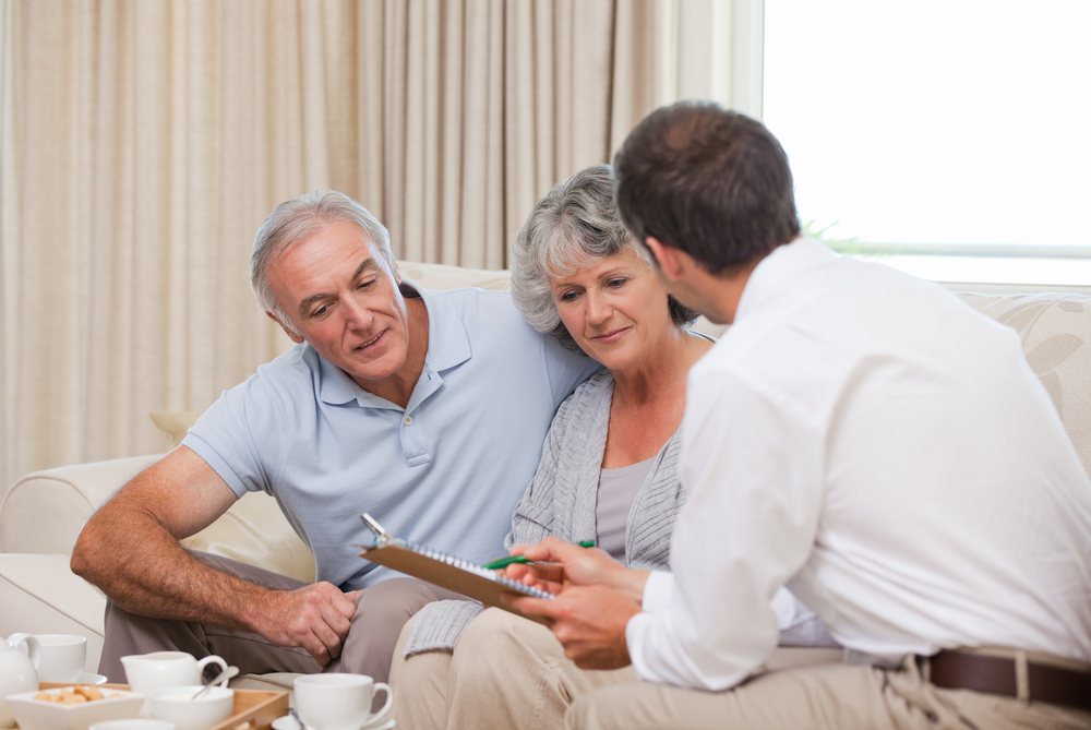 older-man-woman-looking-at-paperwork - IPA 1031 GROUP